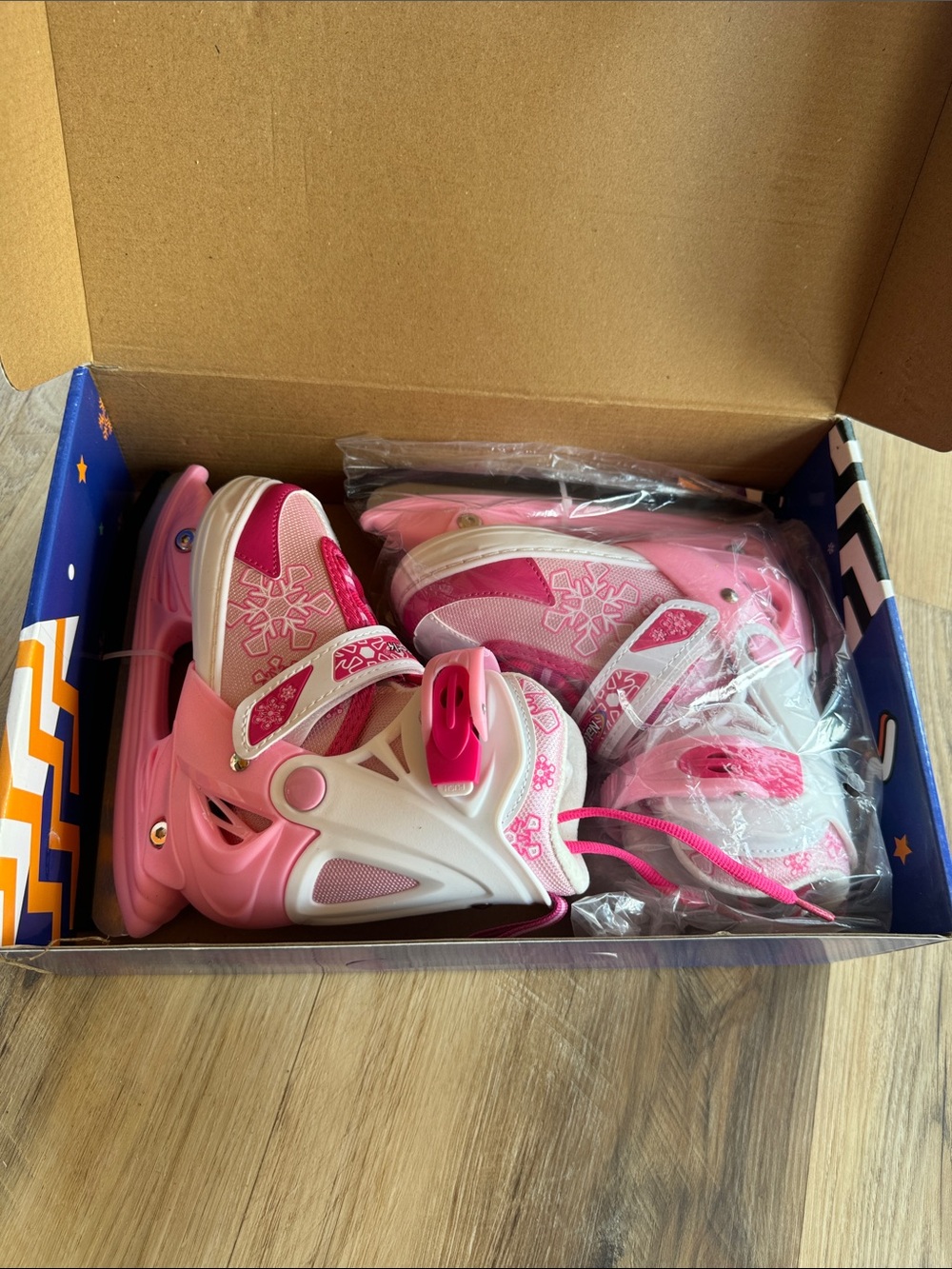 Adjustable Pink Kids Inline Skates with Snowflake Accent